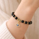 Strength & Clarity Evil Eye Charm Bracelet - Black Obsidian