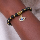 Courage & Stability Evil Eye Charm Bracelet - Lava Stone