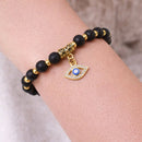 Courage & Stability Evil Eye Charm Bracelet - Lava Stone